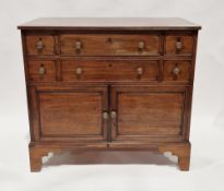 19th century mahogany side cabinet comprising an arrangement of four varying size cockbeaded drawers