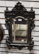 Late 19th century French bronze mirror in the renaissance revival manner, the cast embossed frame