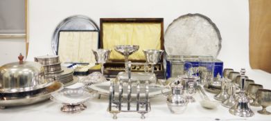 Collection of silverplate and metalware including various flatware, basting spoon, muffin dish,