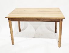 Modern pine rectangular dining table raised on turned legs, 122cm long x 68cm wide x 75cm deep