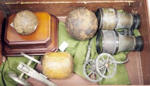 Suitcase of collectables including two iron cannonballs (one with a later made stand), largest 9cm