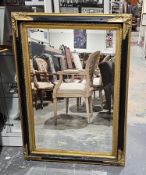Modern gilt and ebonised framed rectangular mirror with bevelled edge plate, 79cm wide x 111cm high