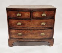 George III oak bowfronted chest of two short over two long graduating cockbeaded drawers, the top
