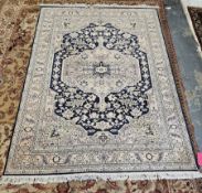 Large Eastern midnight blue ground rug with three central geometric medallions, multiple geometric