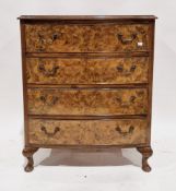 Early 20th century walnut and burr walnut bowfronted chest of four long cockbeaded drawers, the