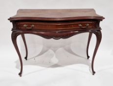 Late 19th/early 20th century French mahogany side table of serpentine form, the shaped top with