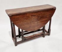 18th century oak oval gateleg table raised on turned and block supports united by square stretchers,