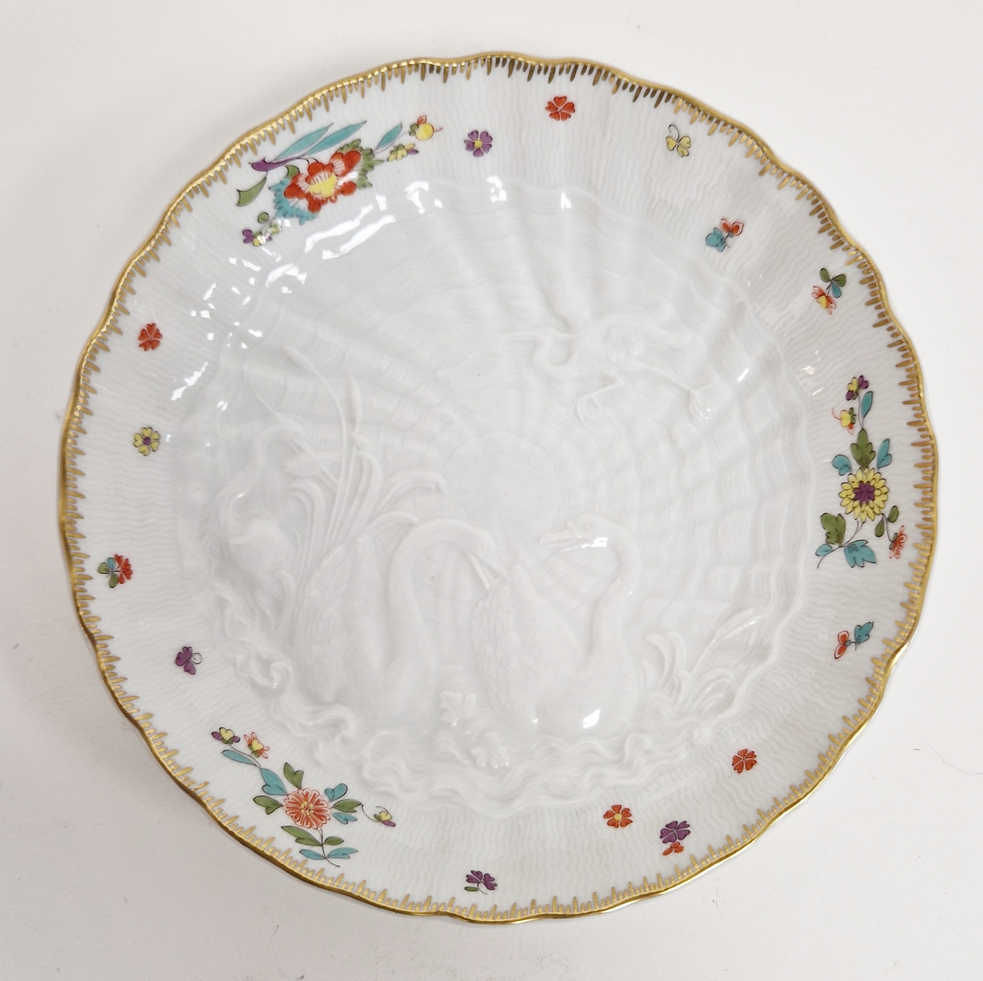 A group of 19th and early 20th century Meissen Swan Service plates and saucers, blue crossed swords, - Image 7 of 10