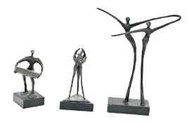 Corry Ammerlaan (Dutch), two contemporary bronze sculptures, one of person carrying a heavy