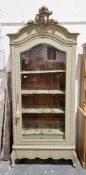 Late 19th/early 20th century French armoire later painted green, the moulded cornice with central