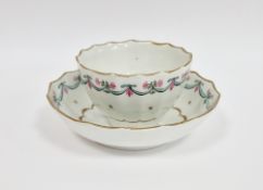 Lowestoft porcelain fluted teabowl and saucer, circa 1790, painted with turquoise and pink swags
