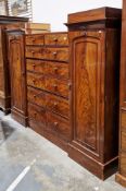 Early 19th century mahogany sentry box type wardrobe, the central section with six graduating