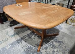 Danish teak extending dining room table by Laurits Larsen, extending with two additional leaves,