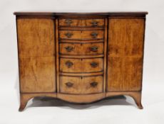 Early 20th century walnut sideboard, the quarter veneered and cross banded top above a bowfronted