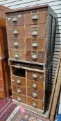 Two early 20th century mahogany banks of eight drawers, each drawer with brass index holder and
