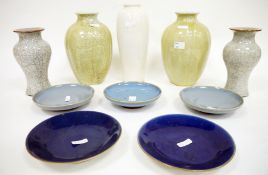 Two pairs of Chinese crackle glazed vases, five blue-glazed saucers and a tapering oviform cream