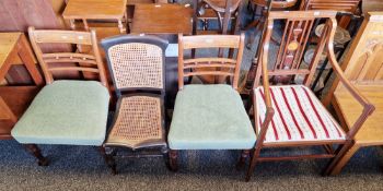 Collection of four chairs including an Edwardian mahogany inlaid elbow chair with inlaid vase-shaped