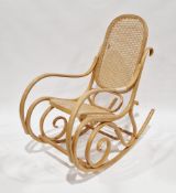 Modern pale beechwood rocking chair in the manner of Thonet, the bentwood frame with a bergere panel