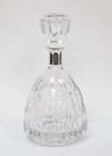 Cut glass decanter and stopper with sterling silver collar, of inverted tapering form with etched