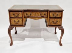 Early 20th century walnut lady's writing desk in the Queen Anne manner, the inverted breakfront
