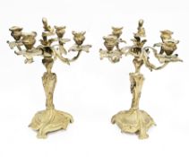 Pair of Louis XV style four-branch ormolu candelabra, cast with foliate scrolling branches and stem,