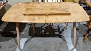 Ercol light elm and beech Grand Plank Windsor extending dining table, model 444, with two additional