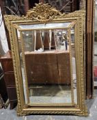 19th century French giltwood and gesso mirror, the ornate frame with floral and foliate scroll