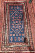 Persian Bedir Turk with certificate, with interesting borders, centre piece red on blue with cream