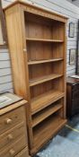 Ercol Mural Range Golden Dawn elm tall bookcase with one fixed shelf and four adjustable shelves,