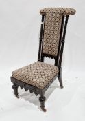 Victorian ebonised prie-dieu chair with woolwork upholstered back and seat, turned reeded and gilded