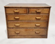 Early to mid 20th century oak chest of two short over three long graduating drawers with oak block