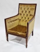 Edwardian mahogany inlaid armchair with gold coloured button back upholstery, raised on square