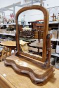 Victorian mahogany framed swing mirror on shaped platform base, 52cm wide x 60cm high