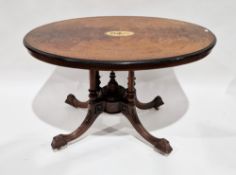 Victorian walnut inlaid oval centre/loo table raised on four inverted tapering turned supports and
