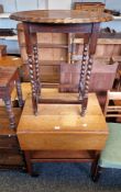 Early 20th century oak oval side table raised on barley twist legs, 61cm long x 73cm high and a