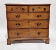 Early 19th century mahogany and string inlaid chest of drawers, the crossbanded top with ogee