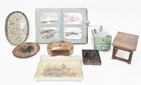 Early 20th century postcard album containing approx. 150 black and white and coloured postcards,