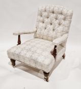 Late 19th/early 20th century button back upholstered armchair, the walnut frame having turned arm
