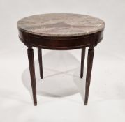 French mahogany circular table with marble top, raised on reeded tapering legs and brass capped