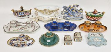 Collection of English and Continental pottery and porcelain inkwells and stands, late 19th/early