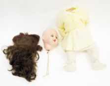 20th century German bisque head doll by Armand Marseille Koppelsdorf, with sleeping blue eyes,