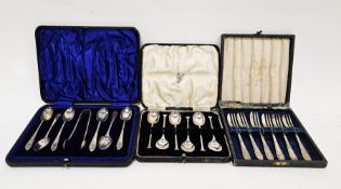 Three cased sets of silver flatware including six teaspoon and sugar tong set, Sheffield 1924,