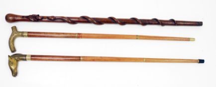 Hardwood walking stick carved with a coiling snake and acorn with oak leaves, 91cm long together