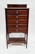 Edwardian mahogany music cabinet, the six drop front drawers with brass drop handles, with shelf