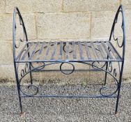Metal conservatory/garden seat with a blue finish, having a slatted seat and two arched ends, 72cm