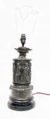 Early 20th century French spelter table lamp, the sides with embossed decoration of classical