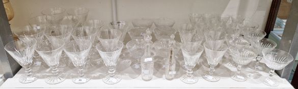 Waterford cut-glass table service, etched marks, cut with flutes, comprising: seven large flared