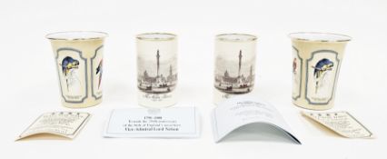 Two pairs of Halcyon Days enamel beakers, the first pair having decoration from Edward Lear's book