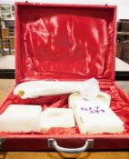 Fitted alabaster desk set to include letter holder, ashtray, pen holder, etc in a red velvet box,