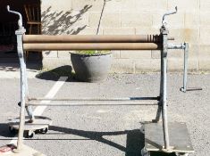 Vintage cast iron hand operated pyramid sheet metal bending rolls, stamped 49 to side, 145cm long